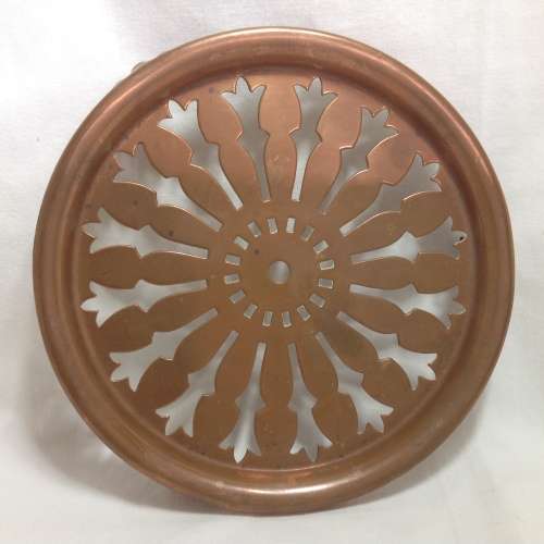 Antique solid copper trivet
