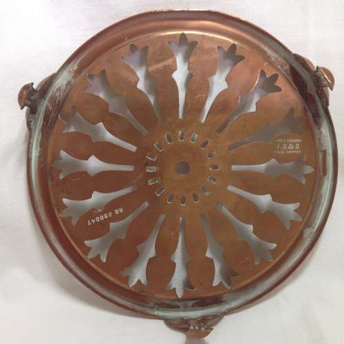 Antique solid copper trivet