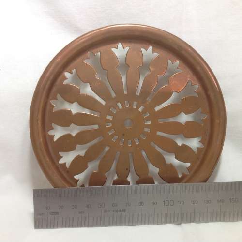 Antique solid copper trivet