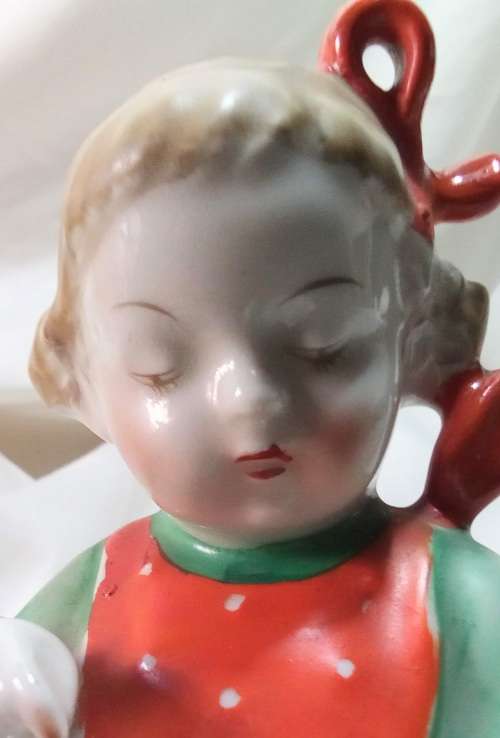 Two beautiful Hummel style little girls reading - Bookends