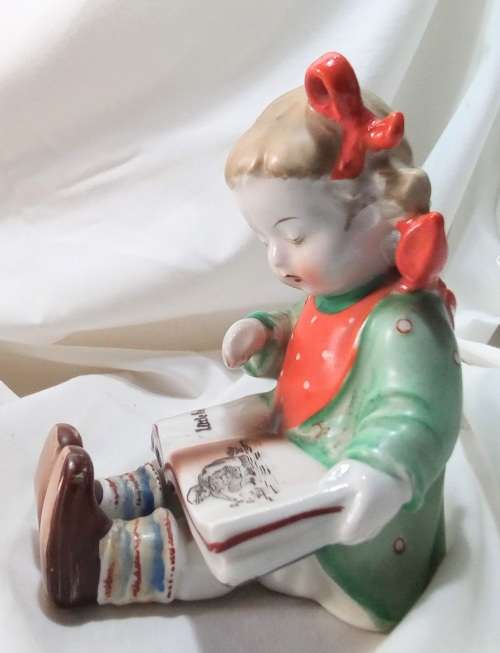 Two beautiful Hummel style little girls reading - Bookends