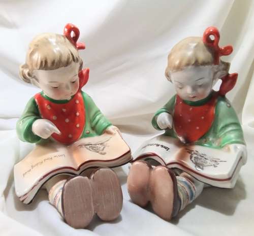 Two beautiful Hummel style little girls reading - Bookends