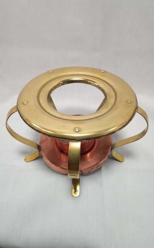 Brass and copper tea pot warmer
