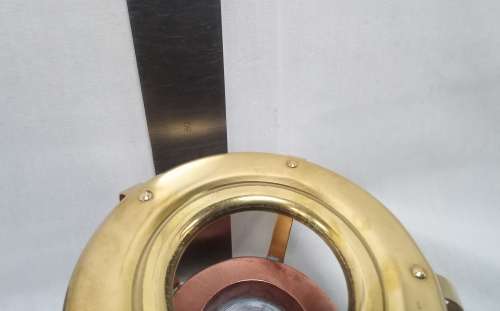 Brass and copper tea pot warmer