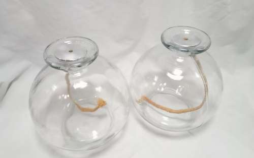 Two large glass oil burners