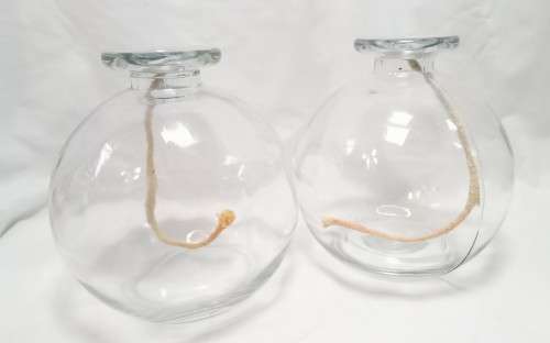 Two large glass oil burners