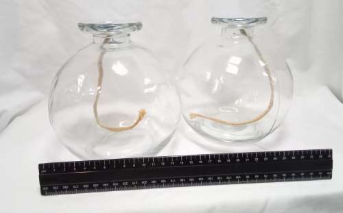 Two large glass oil burners