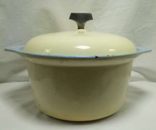 Vintage Yellow round cast iron casserole dish with lid