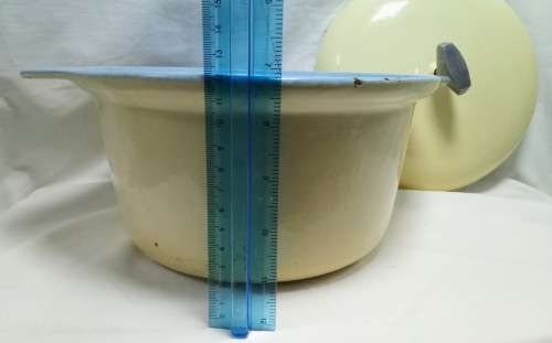 Vintage Yellow round cast iron casserole dish with lid