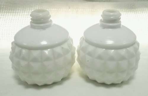 Two tiny Vintage milk glass bottles