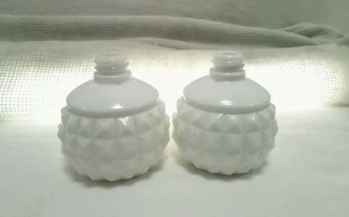 Two tiny Vintage milk glass bottles