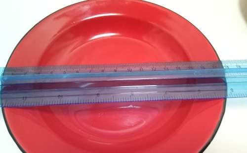 Two Vintage red enamel side plates