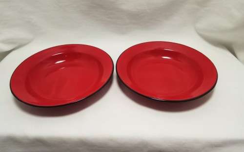Two Vintage red enamel side plates