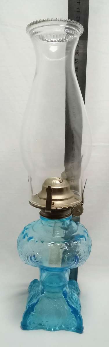 Gorgeous vintage Turquoise glass paraffin lamp