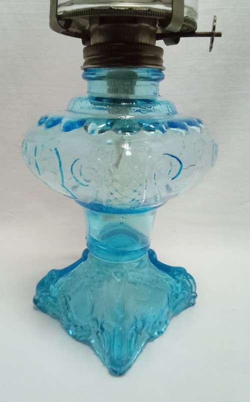 Gorgeous vintage Turquoise glass paraffin lamp