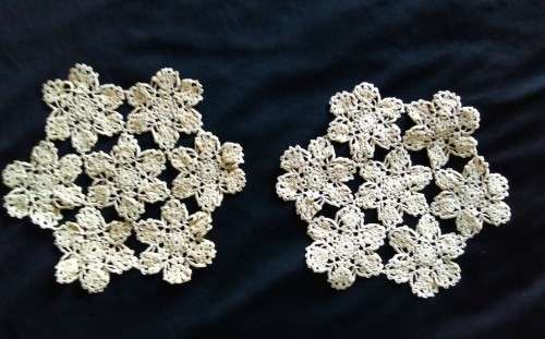 Two round Vintage crocheted doilies in soft yellow