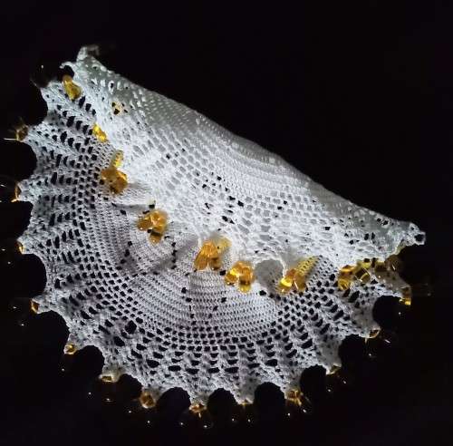 Round Vintage doilie with yellow glass beads