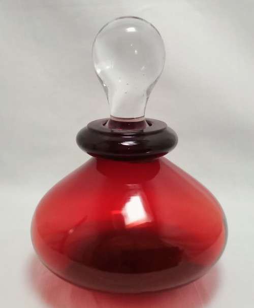Lovely red glass bottle with stopper