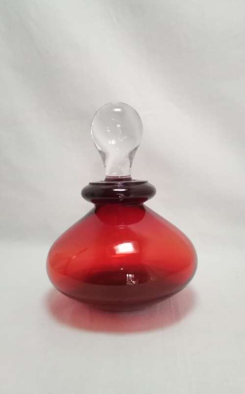 Lovely red glass bottle with stopper