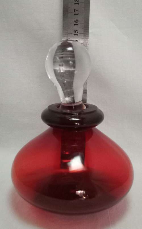 Lovely red glass bottle with stopper