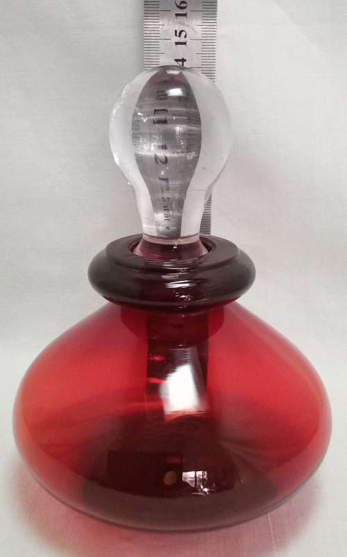 Lovely red glass bottle with stopper