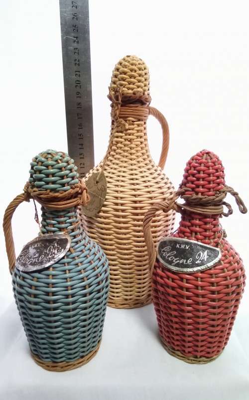 Three vintage KWV cologne bottles