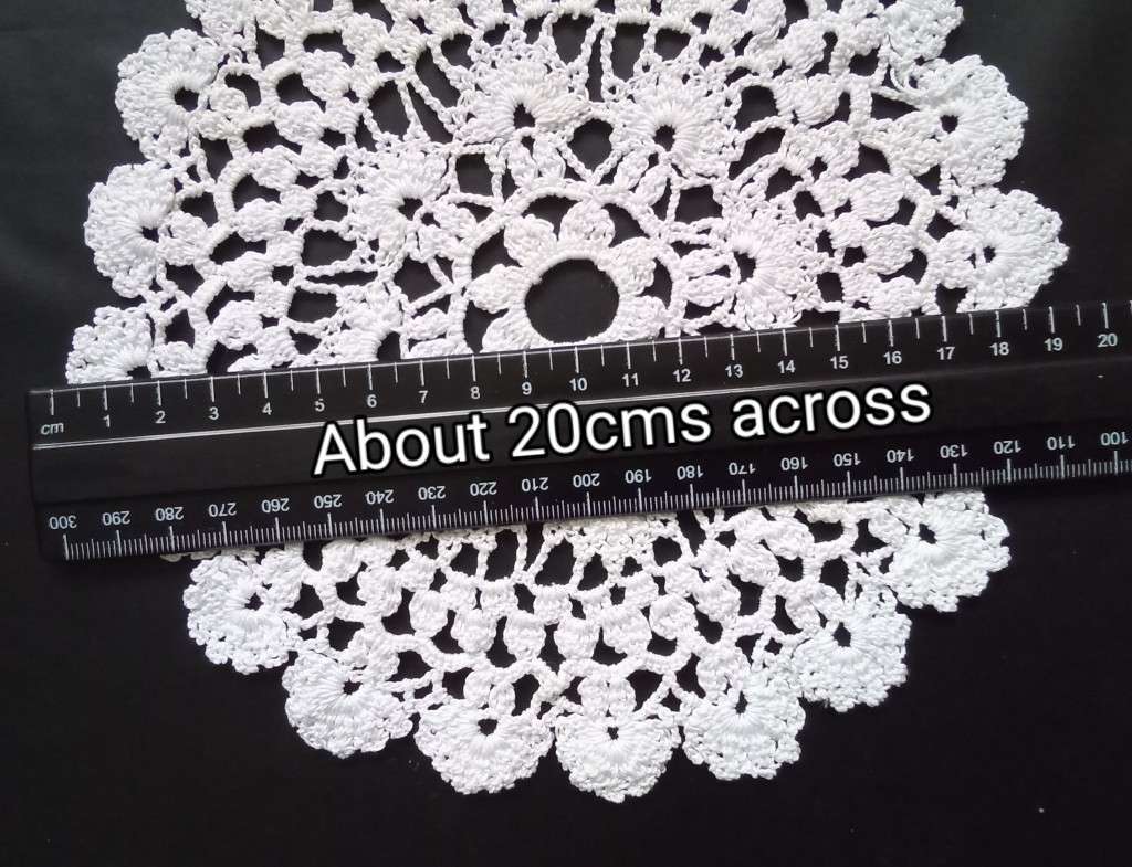 Pretty crocheted doily - about 20cms across