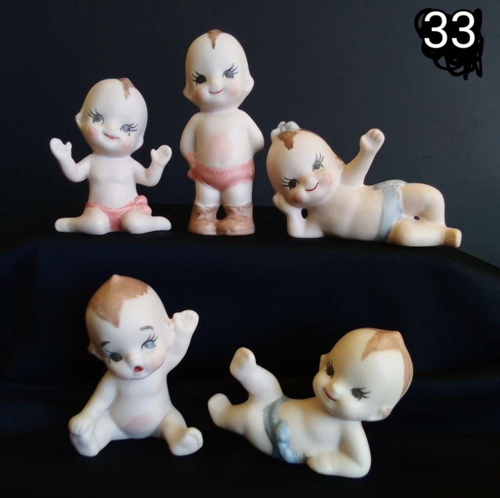 Beautiful set of 5 hand painted porcelain kewpies