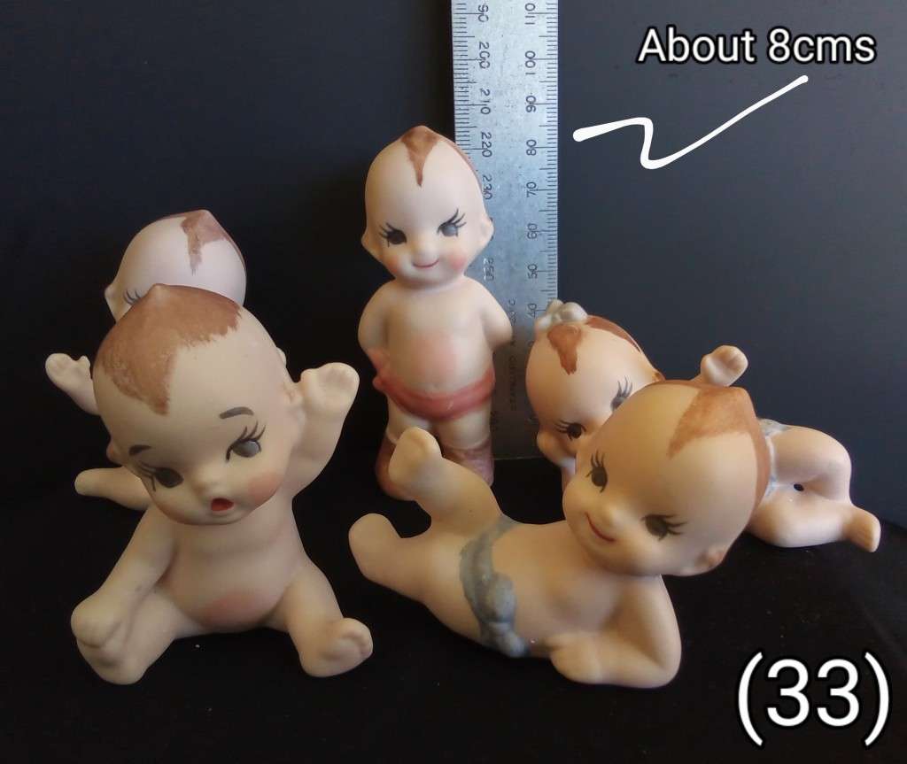 Beautiful set of 5 hand painted porcelain kewpies