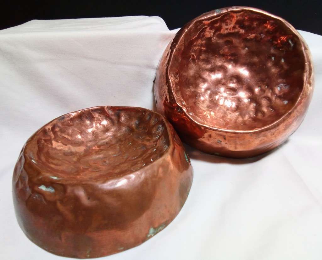 Two stunning rustic hammered copper ashtrays/bowls