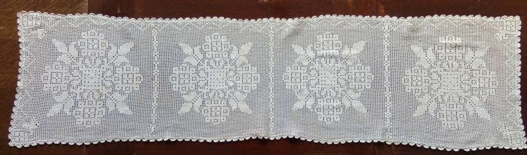 Exquisite!  Very fine vintage filet crocheted table runner.