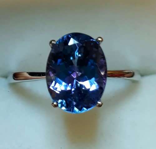3.0 CT TANZANITE AND WHITE GOLD RING