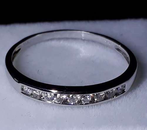 DIAMOND ETERNITY RING - SET IN 18 K SOLID WHITE GOLD