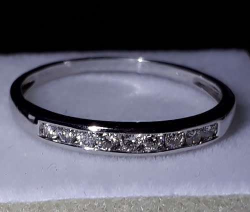 DIAMOND ETERNITY RING - SET IN 18 K SOLID WHITE GOLD