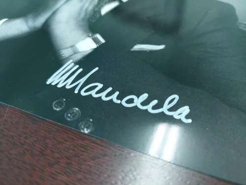 Nelson Mandela photo, signed in white pen (not a print) - size 15cm x 20cm