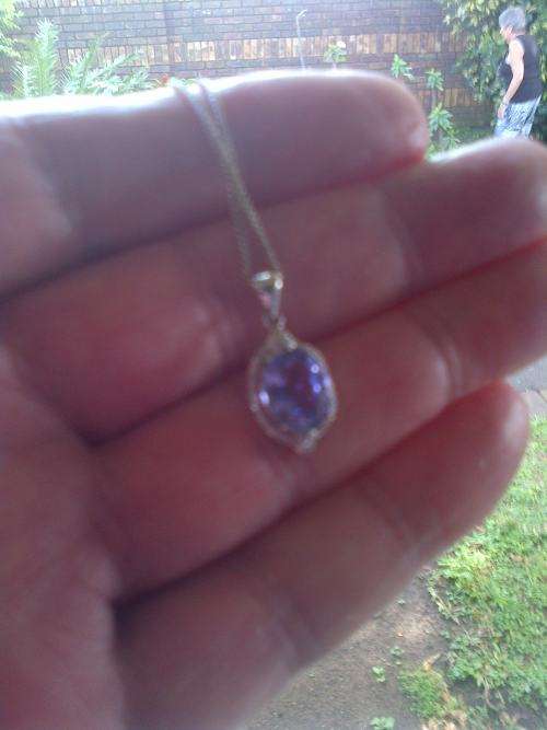 2.92ct Certified Natural Tanzanite set in 14k White Gold With Diamond Accents Pendant With Chain.