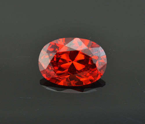 Big! 9.05ct Oval Cut Pinkish Red Zircon. Stunning