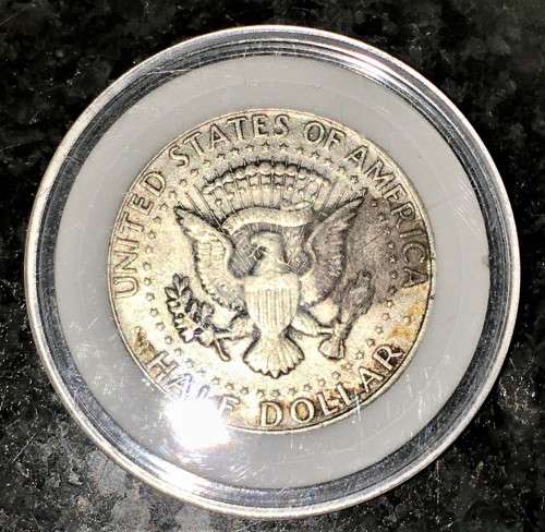 U S A SILVER HALF DOLLAR 1964 IN PROTECTIVE CAPSULE