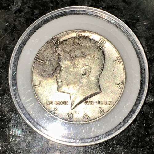 U S A SILVER HALF DOLLAR 1964 IN PROTECTIVE CAPSULE