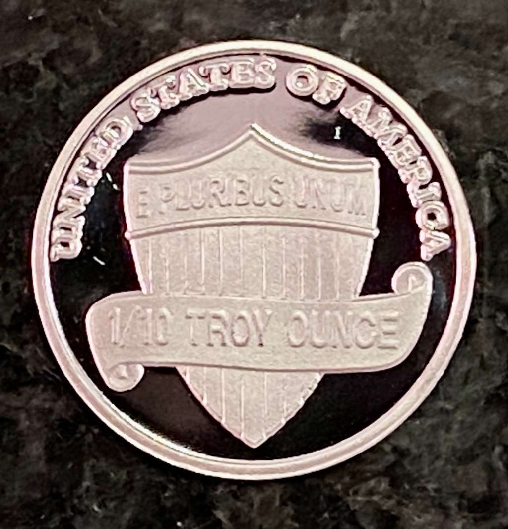 U S A -- SHIELD PENNY -- LINCOLN - IN GOD WE TRUST - 1/10 TROY OZ FINE SILVER - 99,99 SILVER ROUND