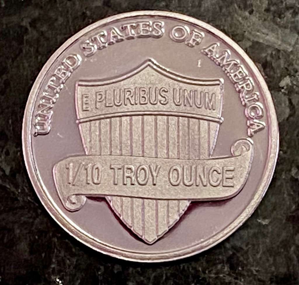 U S A -- SHIELD PENNY -- LINCOLN - IN GOD WE TRUST - 1/10 TROY OZ FINE SILVER - 99,99 SILVER ROUND