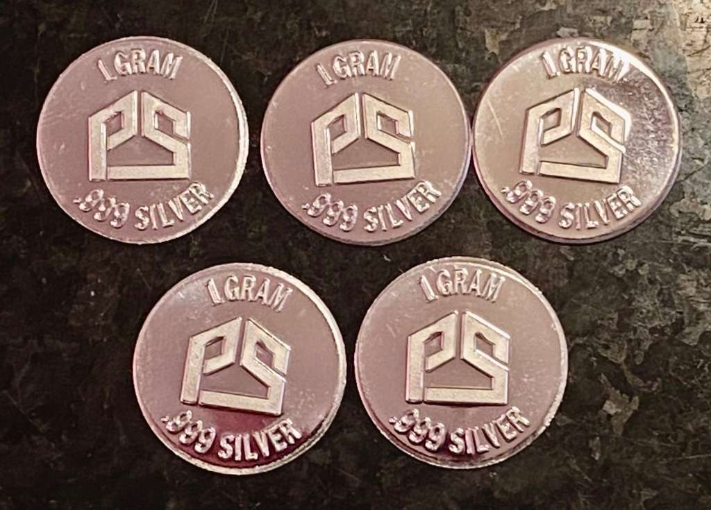 999 SILVER ROUNDS -- SMILEYS -- 1 GRAM FINE SILVER ROUND (BID PER SMILEY)