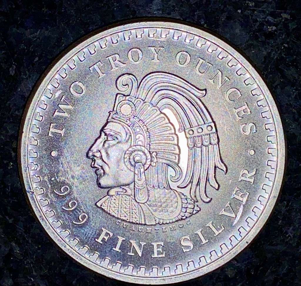 AZTEC 2OZ SILVER ROUND - 2OZ PURE SILVER .999 COMES IN WORLD COIN POUCH