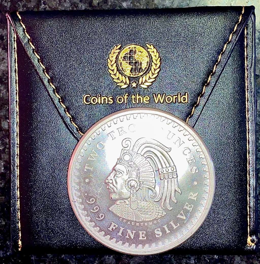 AZTEC 2OZ SILVER ROUND - 2OZ PURE SILVER .999 COMES IN WORLD COIN POUCH