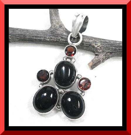 BLACK ONYX AND GARNET STERLING SILVER PENDANT