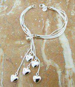 *R1* - STERLING SILVER CHARM BRACELET