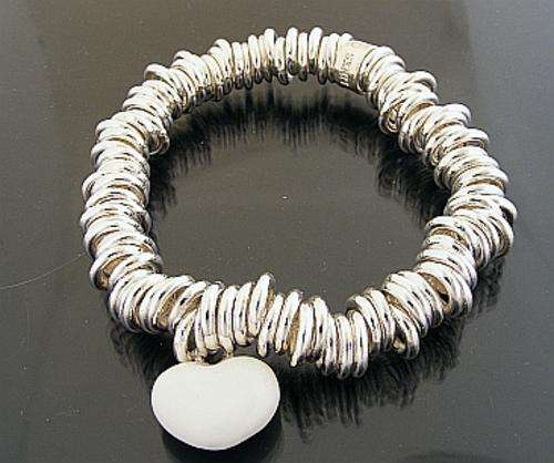 "LINKS OF LONDON" STYLE STRETCH BRACELET WITH WHITE HEART CHARM
