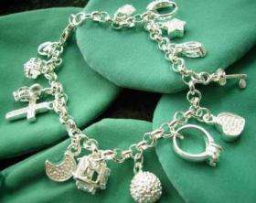 STERLING SILVER MULTI CHARM BRACELET