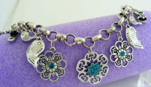 TIBETAN SILVER CHARM BRACELET