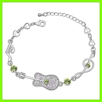 *R1* - STUNNING GREEN SWAROVSKI ELEMENTS GUITAR BRACELET